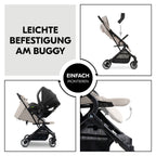Nærbilde av festemekanisme på adapter for babystol til Travel N Care, svart