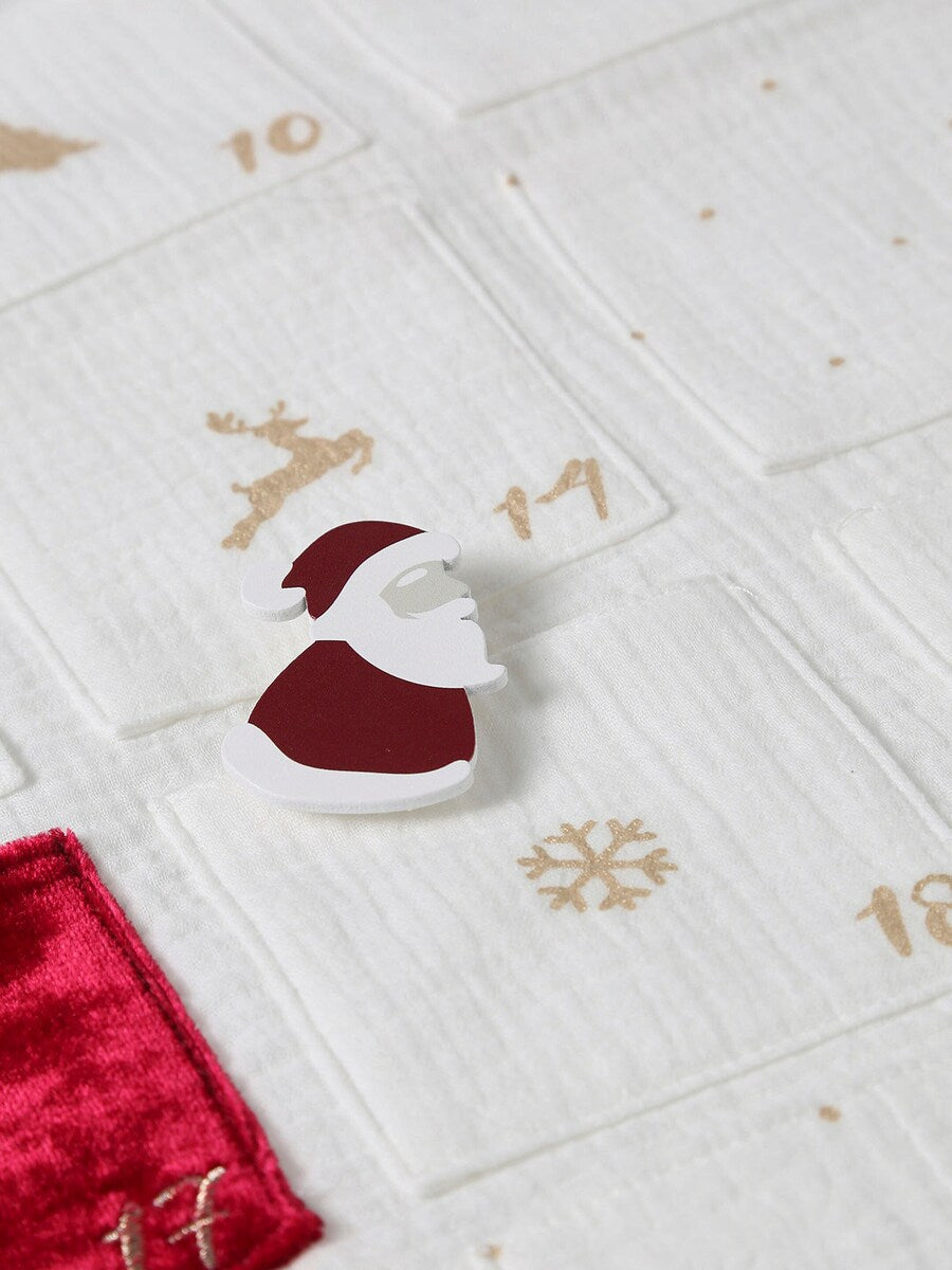 Nærbilde av lommene på adventskalender i bomullsmusselin med 24 lommer
