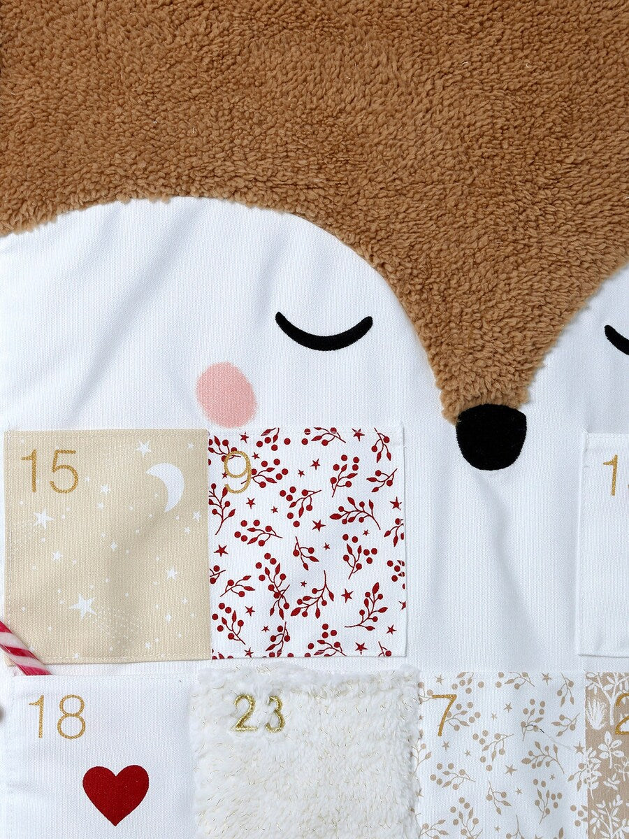 Detalj av gyllent gevir på adventskalender reinsdyr