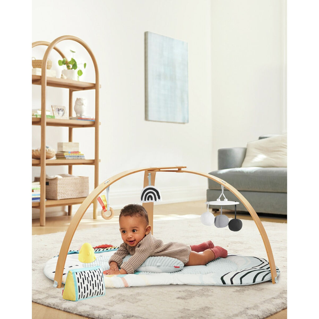 Bakside av Aktivitetsbue Montessori med lekematte og 5 leker