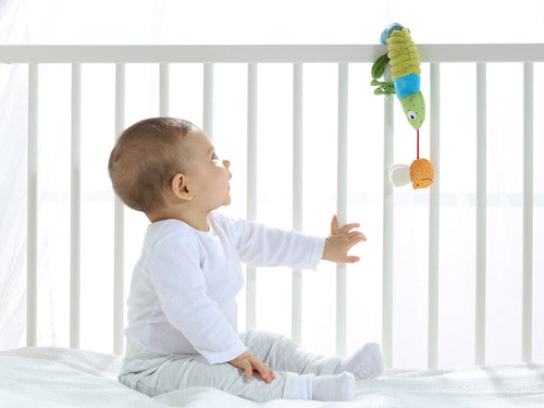 Aktivitetsleke kameleon med rangle til babystol bakside