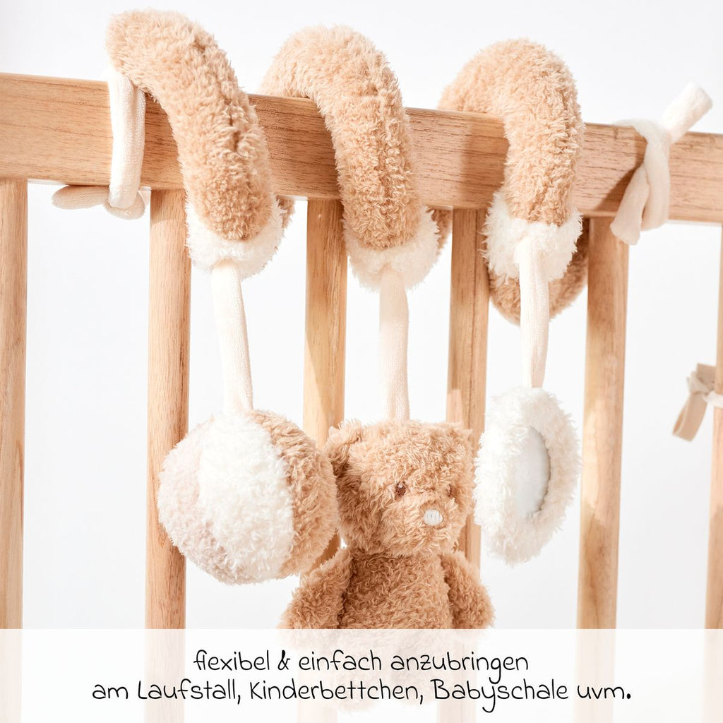 Detalj av rangle og speil på aktivitetsspiral bjørn Teddy