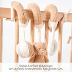 Detalj av rangle og speil på aktivitetsspiral bjørn Teddy