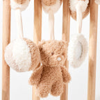 Montert aktivitetsspiral bjørn Teddy med rangle og speil på babybett
