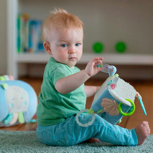 Bakside av Aktivitetsterning Meereskinder med rangle og speil
