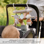 Detaljbilde av knitrepapir på aktivitetstrapes med rangle og pipelyd, esel og sau - Fehn