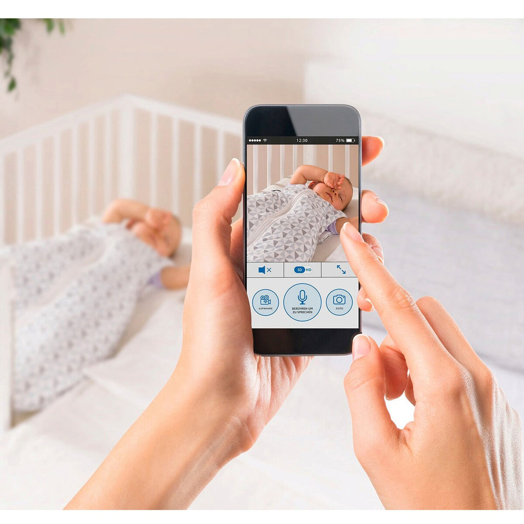 Nærbilde av kameraets linse på Babycall IP BabyCam med kamera og app