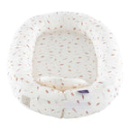 Nærbilde av materiale babynest HOME Comfort med madrass
