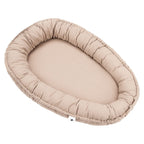 Babynest NIDO i bomullsmusselin, sand forfra