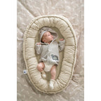 Babynest NIDO musselin 80x55 cm detalj av stoff