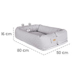 Babynest Style grå med bjørnemotiv - roba montert på sofa