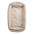 Babynest i vaffelpiqué med vendbart design bakside med ensfarget mønster