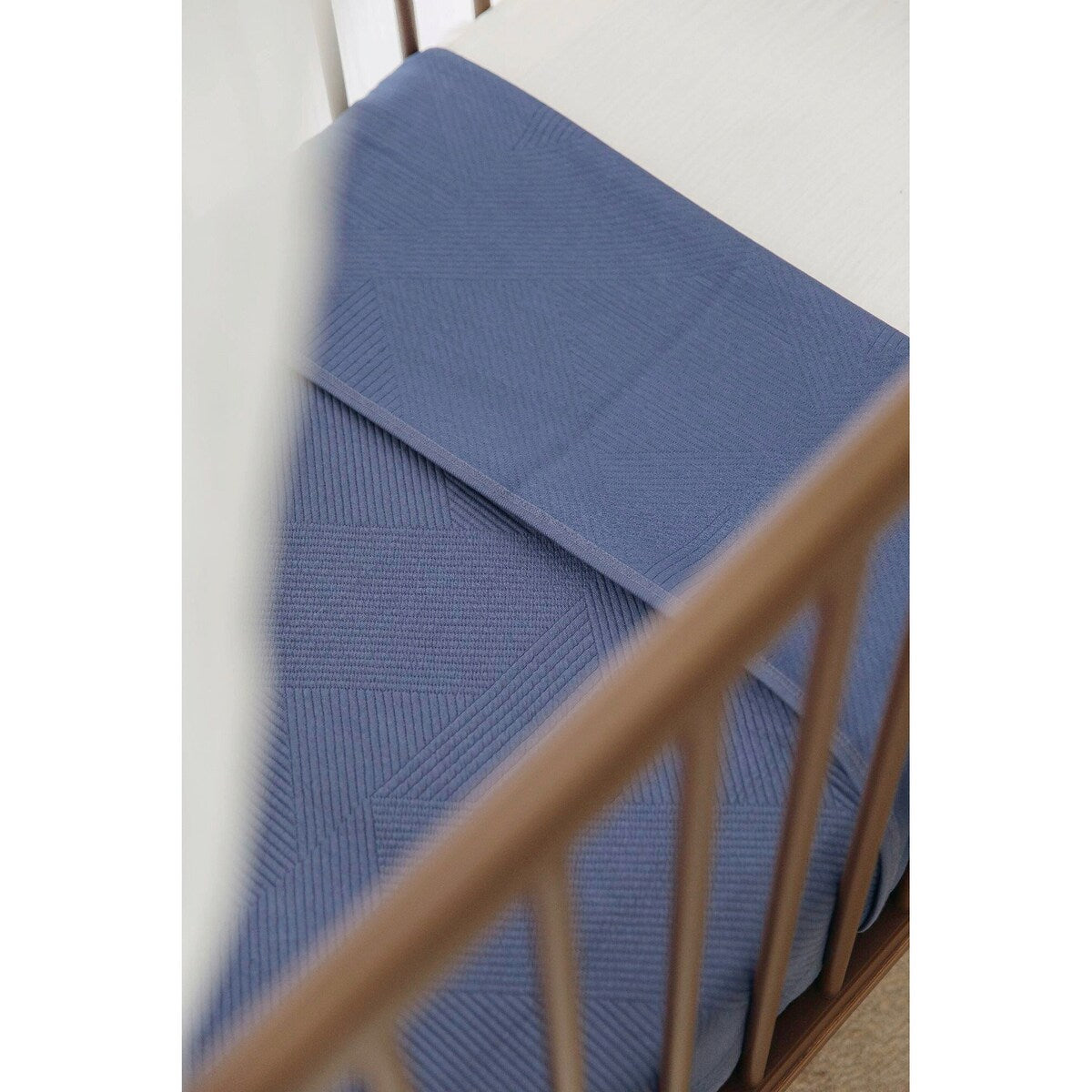 Babyteppe 75x100 cm 0.5 TOG med bomull sammenrullet