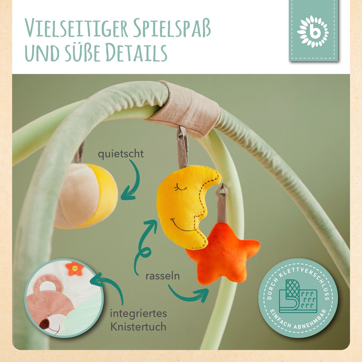 Detalj av aktivitetsbue på babyteppe med bomull 90x90 cm fra Bieco
