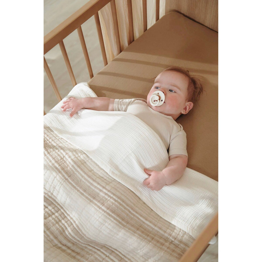 Nærbilde av tekstur på babyteppe musselin bomull 75x100 cm 1.5 TOG Meyco Baby