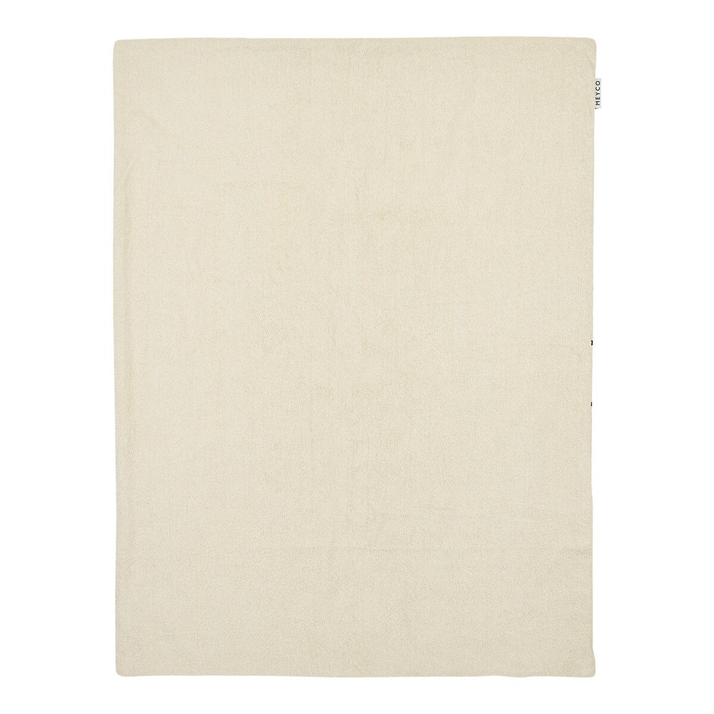 Nærbilde av tekstur på babyteppe i musselin og frotté 75x100 cm forvasket