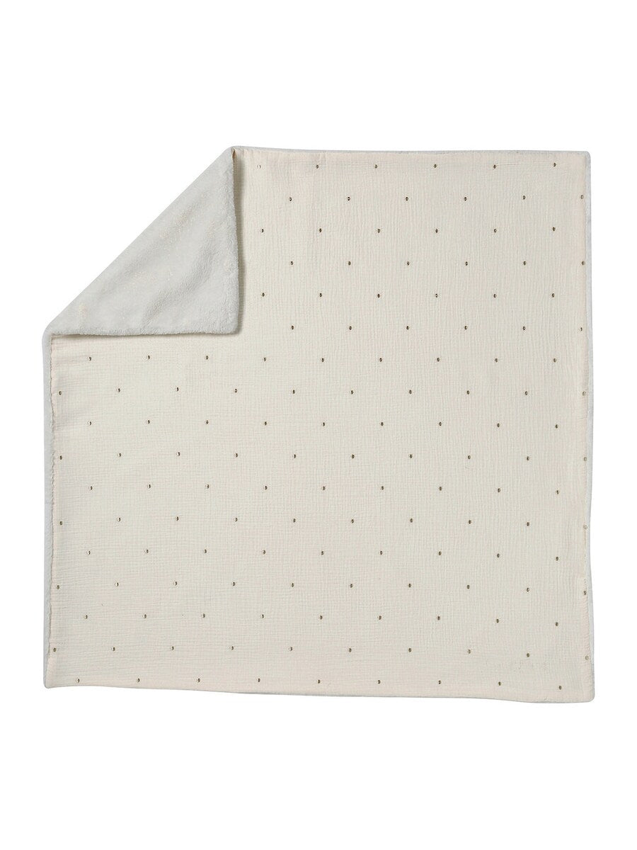 Bakside av babyteppe i økologisk bomull og resirkulert polyester med broderte prikker