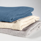 Babyteppe i strikkelook Seashells oyster 80x80 cm detalj av strikkemønster