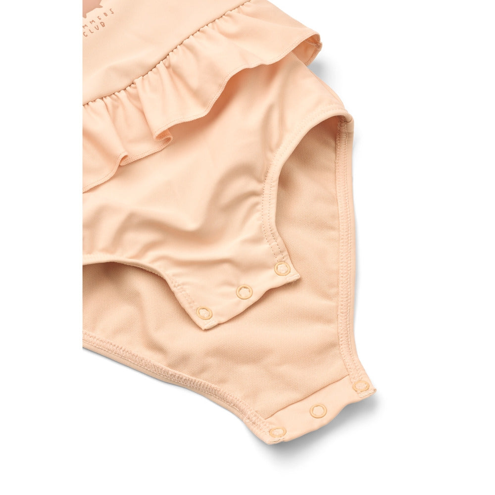 Detalj av sløyfe på badedrakt med resirkulert polyester UPF 50+
