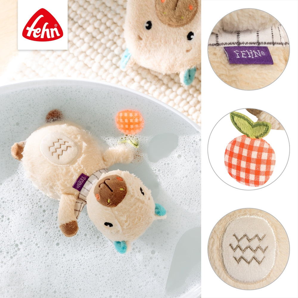 Nærbilde av materialet på badeleke capybara flytende badedyr for baby