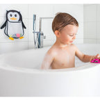 Montert Badeleketøysnett med sugekopper MyHappyPingu på flisvegg