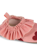 Nærbilde av stoff på Badesko Merle amour pink UPF 50+ str. 24-25