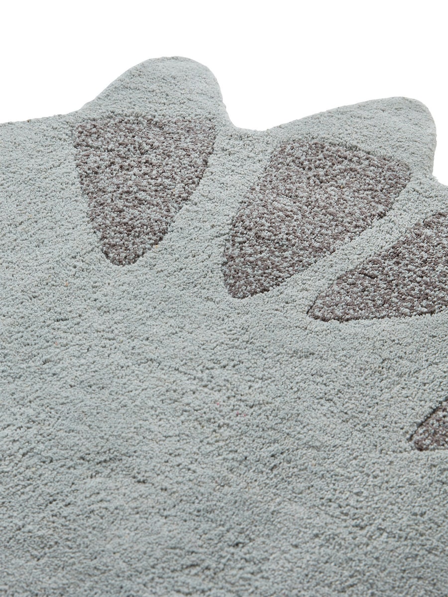 Barneromsteppe dinoform 66x125 cm bomull detalj nærbilde