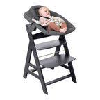 Barnestol Alpha+ med newborn-sett i bøk detalj av 5-punkts sele
