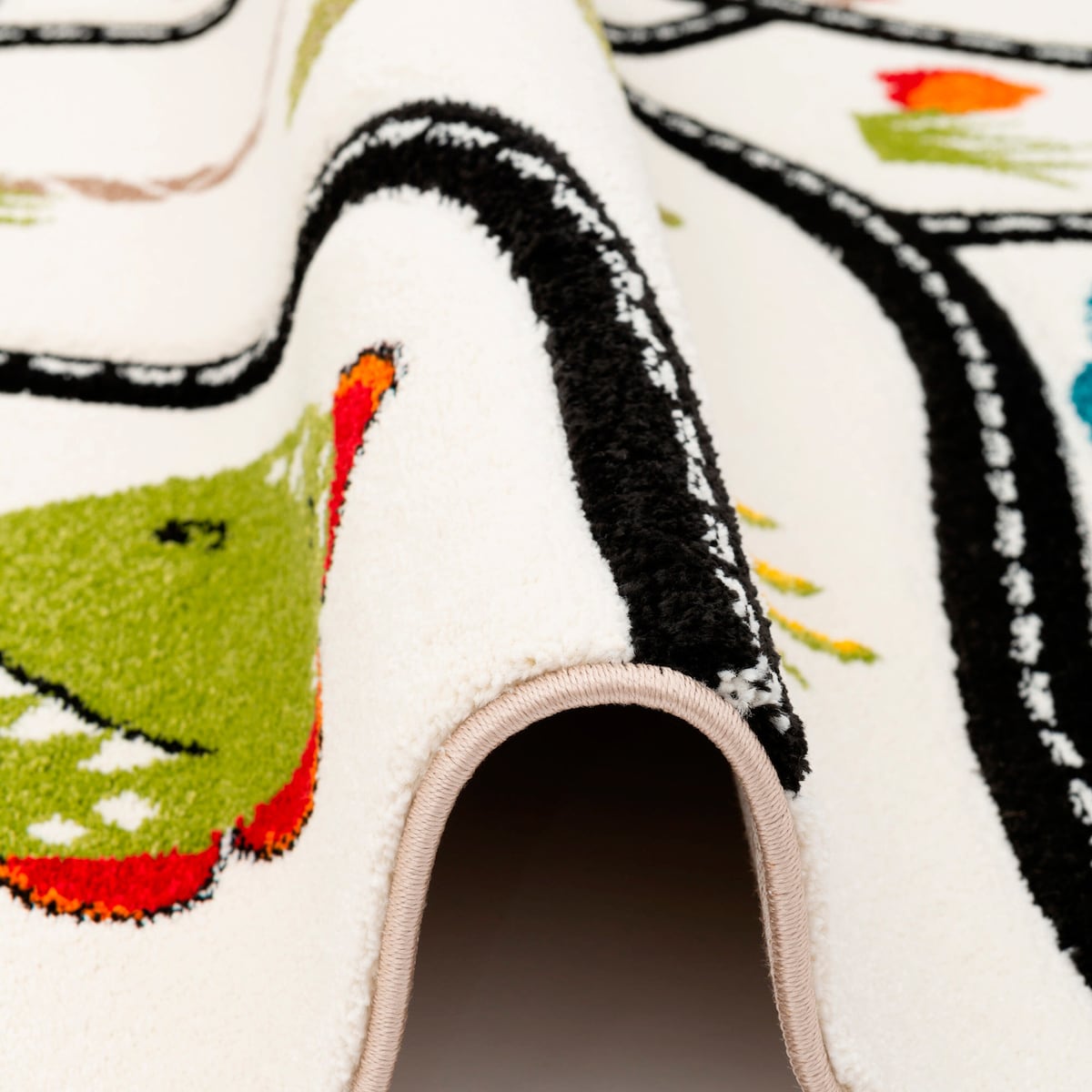 Barneteppe Maui Kids dino med veimotiv fargerikt design