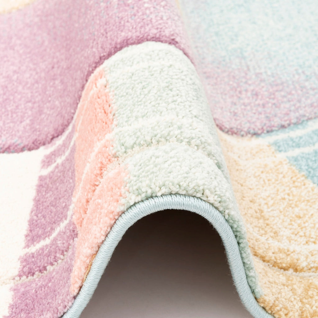Detalj av håndkonturensnitt på Barneteppe Maui Kids Rainbow Star