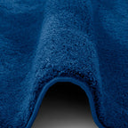 Detalj av langfloret på Barneteppe Silky Kids rundt langfloret 100 % polyester