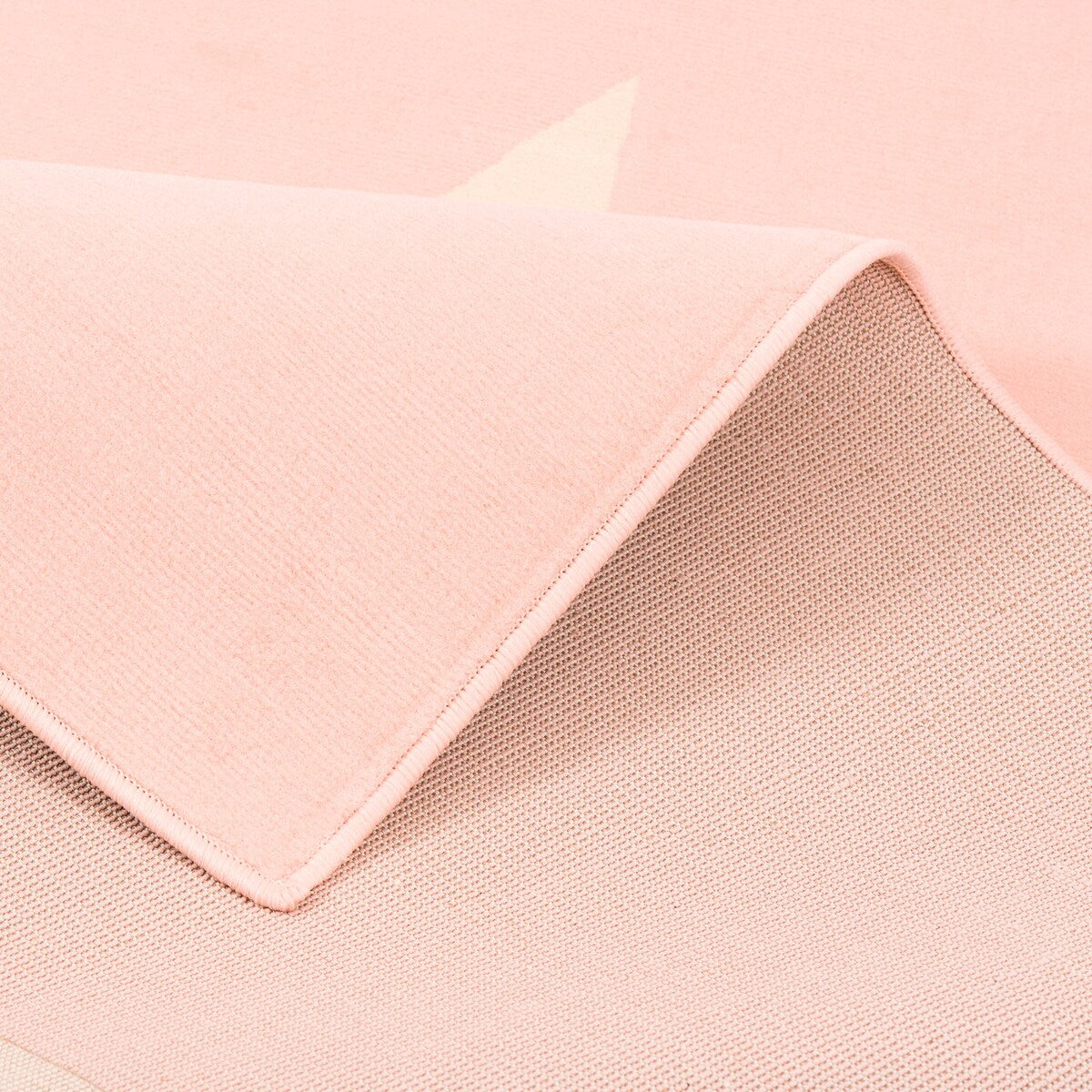 Detalj av mønster på Barneteppe Trendline stjernemønster pastell
