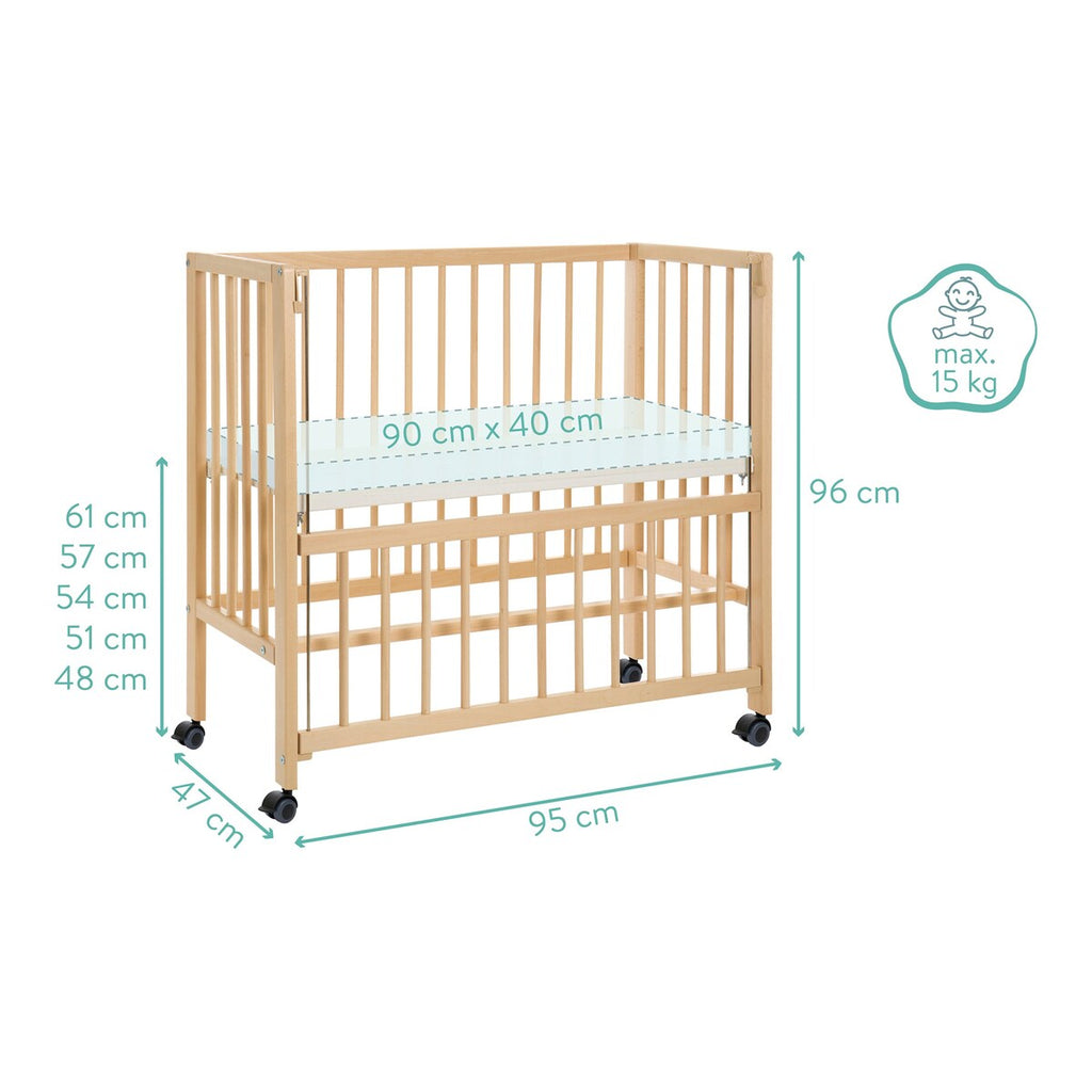 Nærbilde av bedside crib Cocon 40x90 cm massiv bøk med hjul spiler