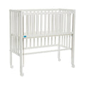 Bedside crib Cocon Plus med hjul i massiv bøk forfra