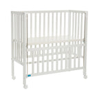 Bedside crib Cocon Plus med hjul baksiden visning