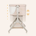 Sidevisning av Bedside crib Leonie Plus 3-i-1 med madrass og hjul