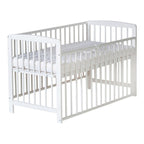 Nærbilde av bedside crib Micky 60x120 cm i massiv bøk