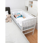 Bedside crib Micky Plus med justerbart lattenrost