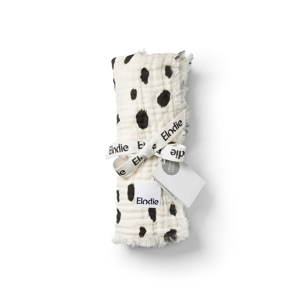 Nærbilde av stoffstruktur på Bomullsteppe Dalmatian Dots Grande