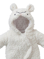 Klettlukking foran på dukkedress i teddyfleece