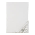 Nærbilde av stoffstruktur på Formsydd laken TENCEL™ lyocell 90x200 cm - baby-walz BASICS