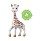Nærbilde av rangle og stoffbok i Gavesett med biteleke, rangle og tøybok i naturgummi Sophie la girafe
