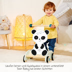 Detaljbilde av gummihjul på gåvogn i tre, panda-design