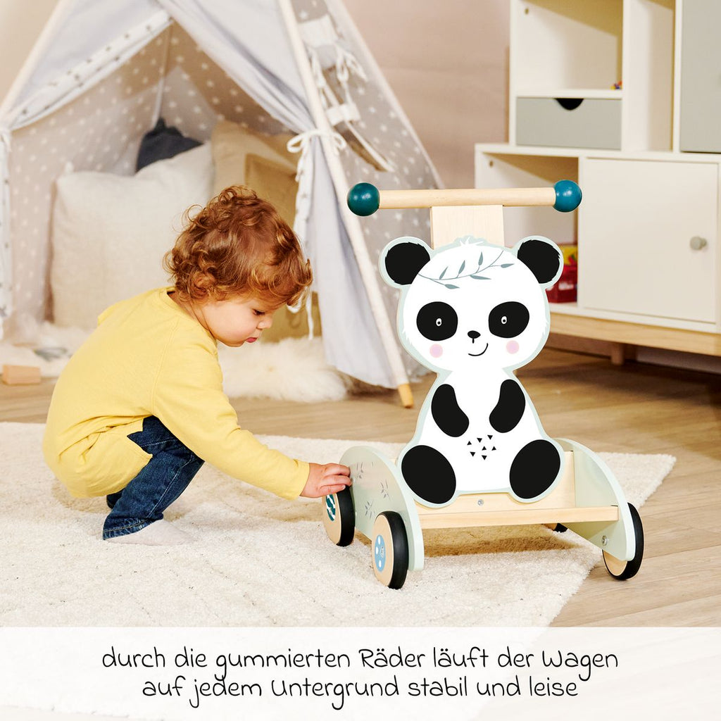 Nærbilde av stabil haltestang på gåvogn i tre, panda-design