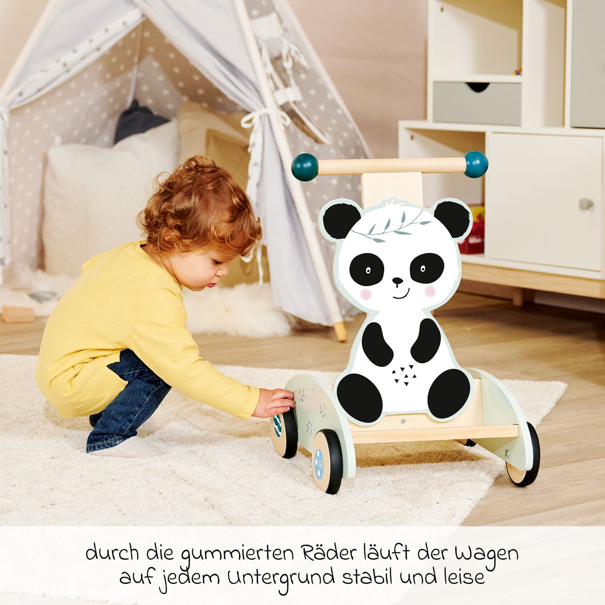 Nærbilde av stabil haltestang på gåvogn i tre, panda-design