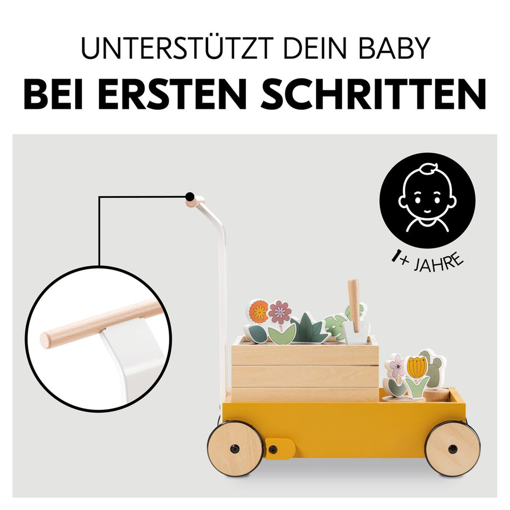 Detaljbilde av justerbar brems på Gåvogn i tre Learn to Walk med hagetilbehør