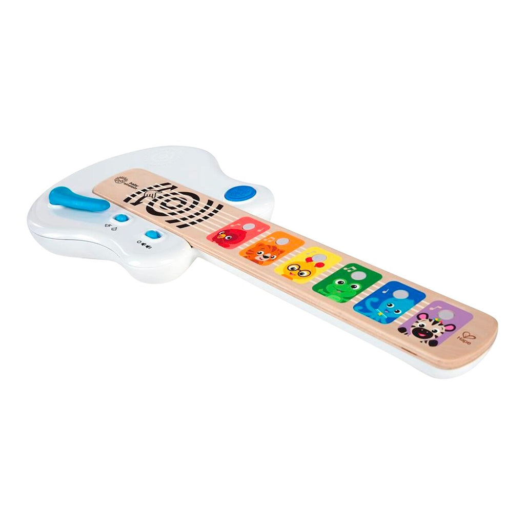 Barn som leker med Gitar Magic Touch i tre med 2 spillmoduser