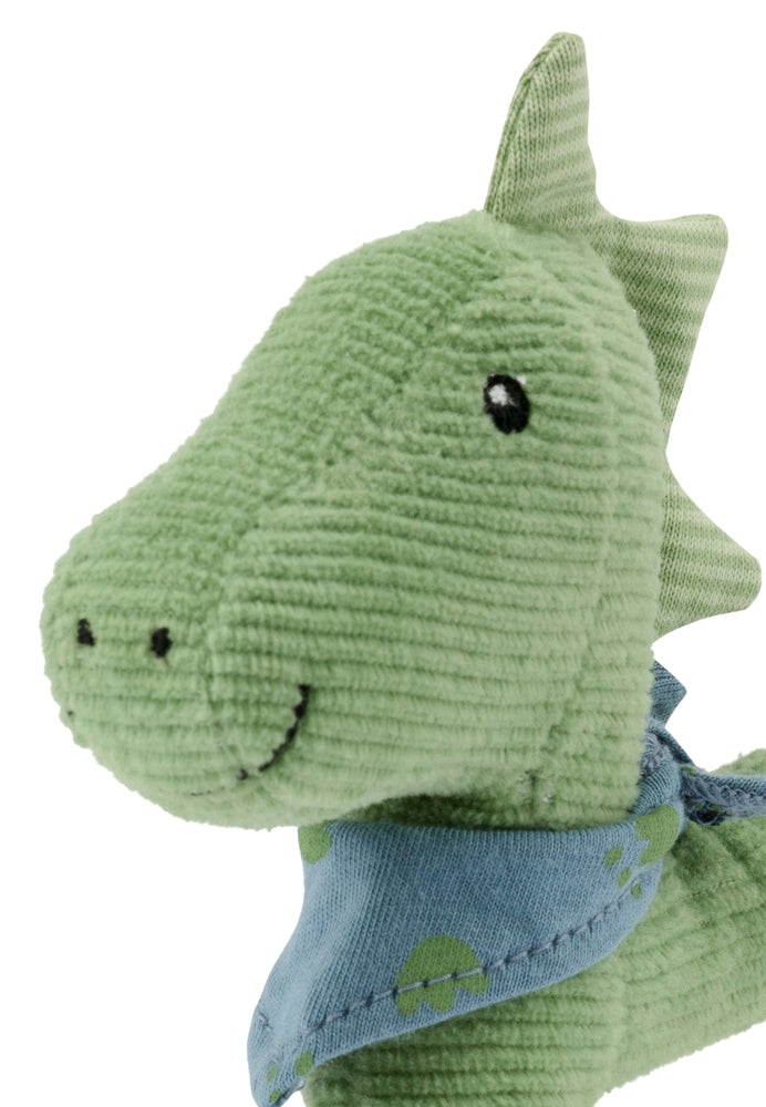 Gripering Dino Rexi montert i babys hånd