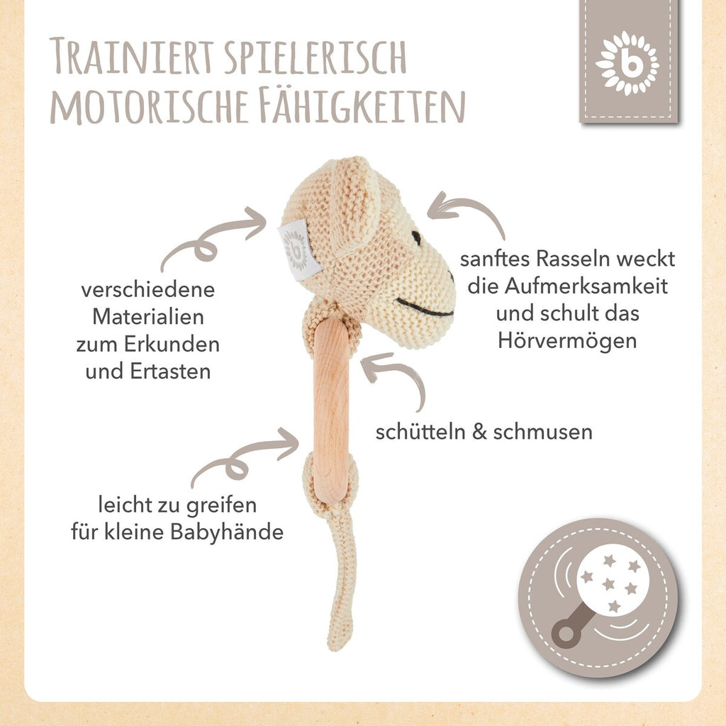 Gripering med rangle i tre og bomull, ape montert