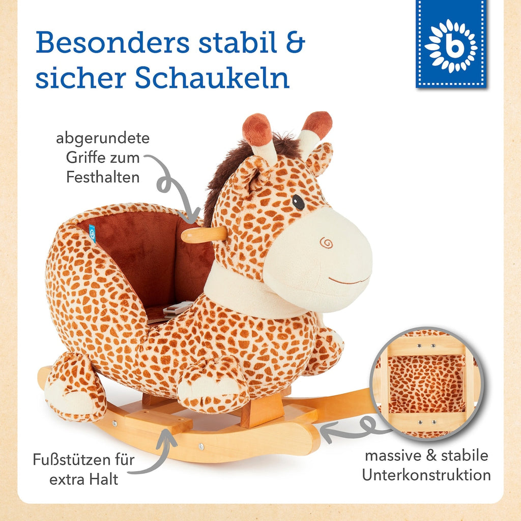 Detalj av gyngedyr giraff i plysj